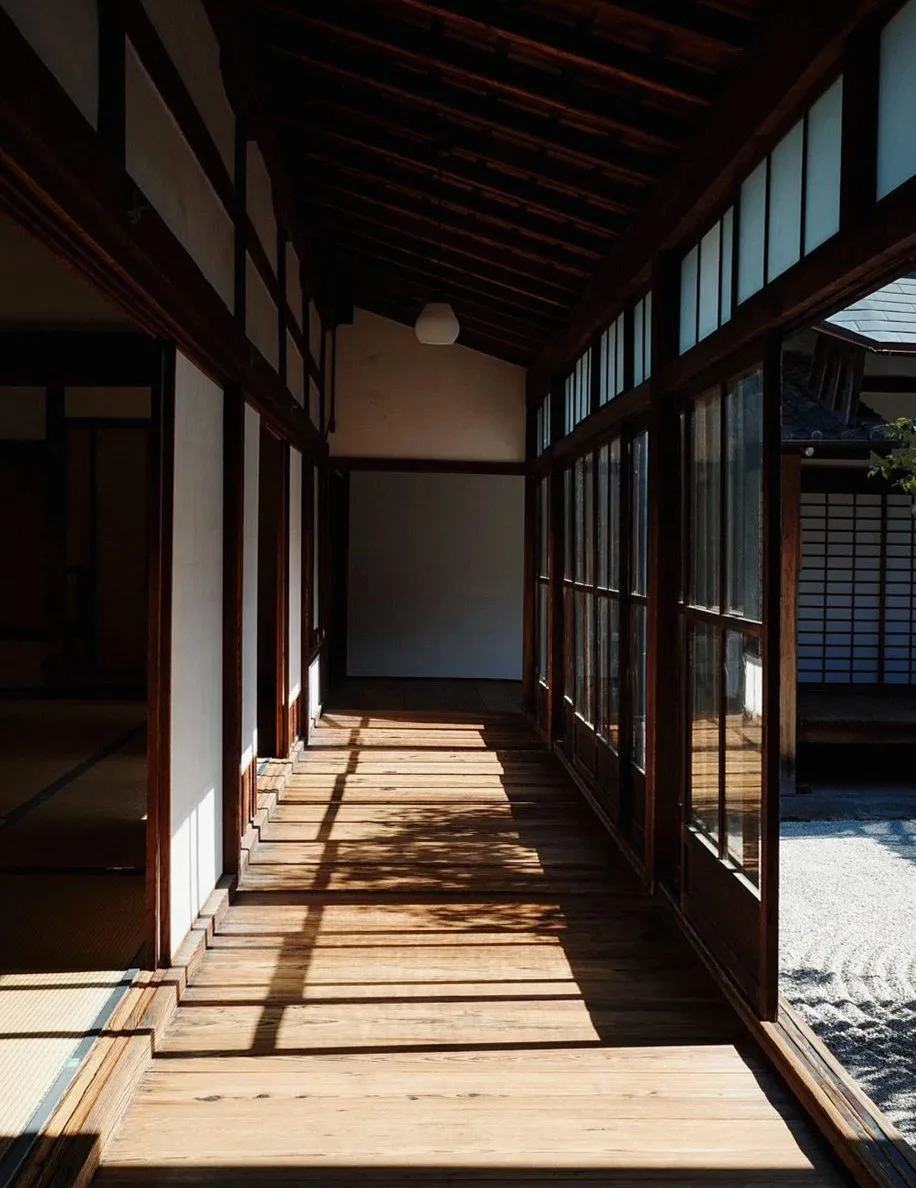 Sunlit wooden veranda corridor of a traditional Japanese building